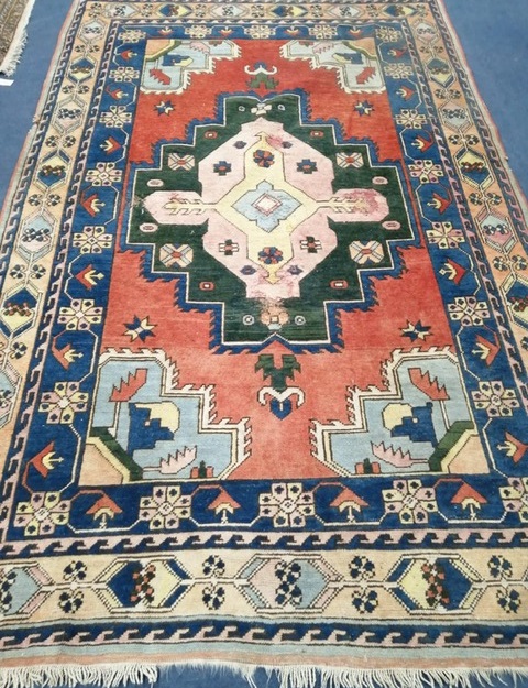 A Caucasian Kazak geometric rug, 295 x 175cm